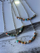 Spiny oyster and turquoise beaded chain necklace by Wild Junkie, featuring vibrant, handcrafted jewelry with colorful beads.