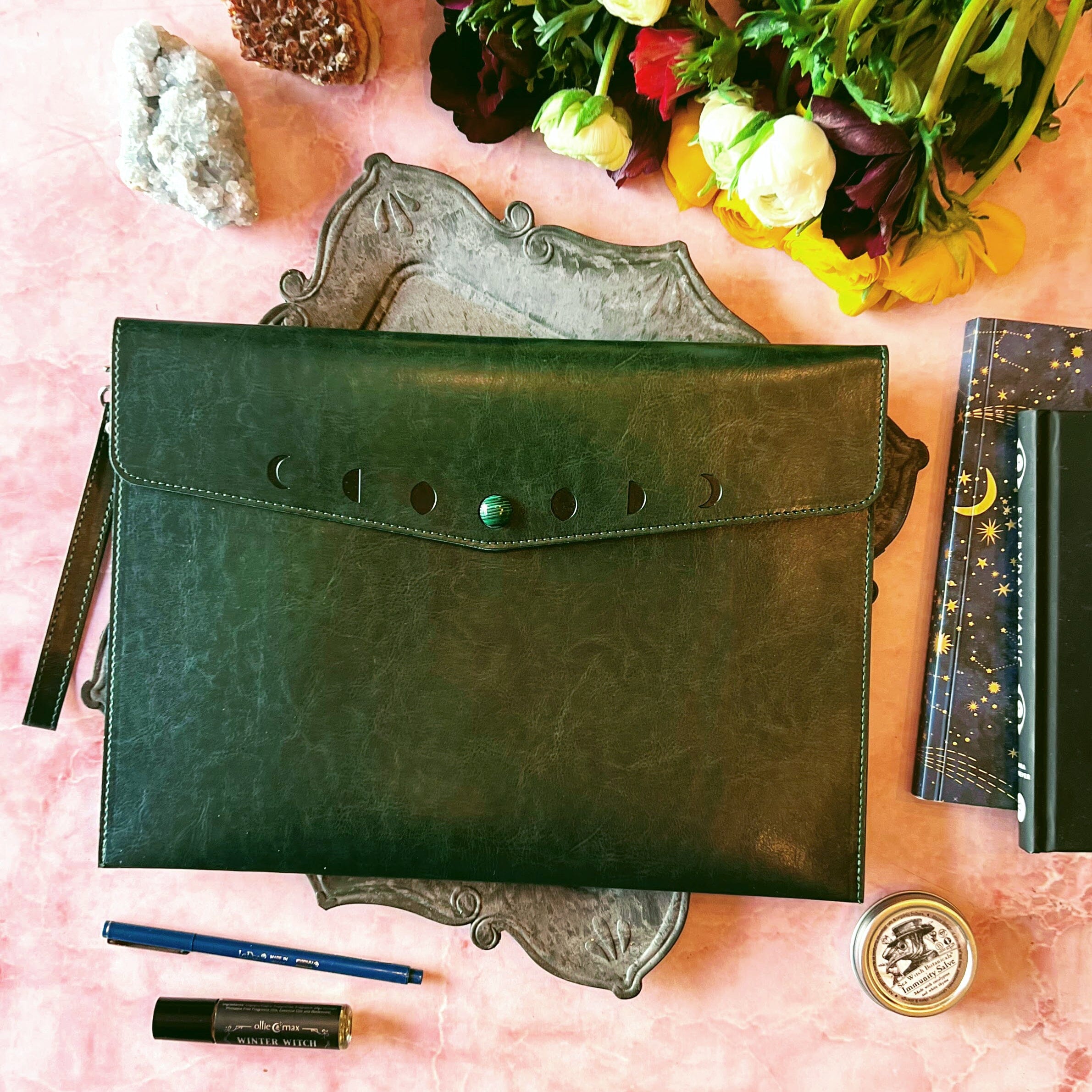 Navy Moon Phases clutch purse by Spirit Nest, a stylish accessories bag with moon phase design and secure zipper closure.