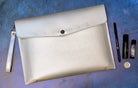 Navy Moon Phases Clutch Purse by Spirit Nest, featuring a celestial moon phase design, perfect as a stylish accessories piece.