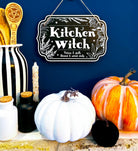 Wooden witchy décor sign for home, featuring a spooky design, from Spirit Nest, ideal for kitchen or witch-themed home décor.