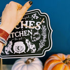 Wooden witchy décor sign by Spirit Nest with spooky lettering, perfect for home Halloween or witch-themed kitchen decor.