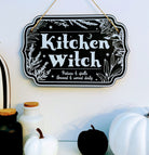 Wooden witchy décor sign for home from Spirit Nest with mystical text, perfect for adding a spooky touch to your kitchen or space.