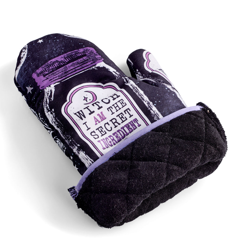 Pair of Spirit Nest Kitchen Witch oven mitts with purple, black, and white witch herb designs for kitchen use.