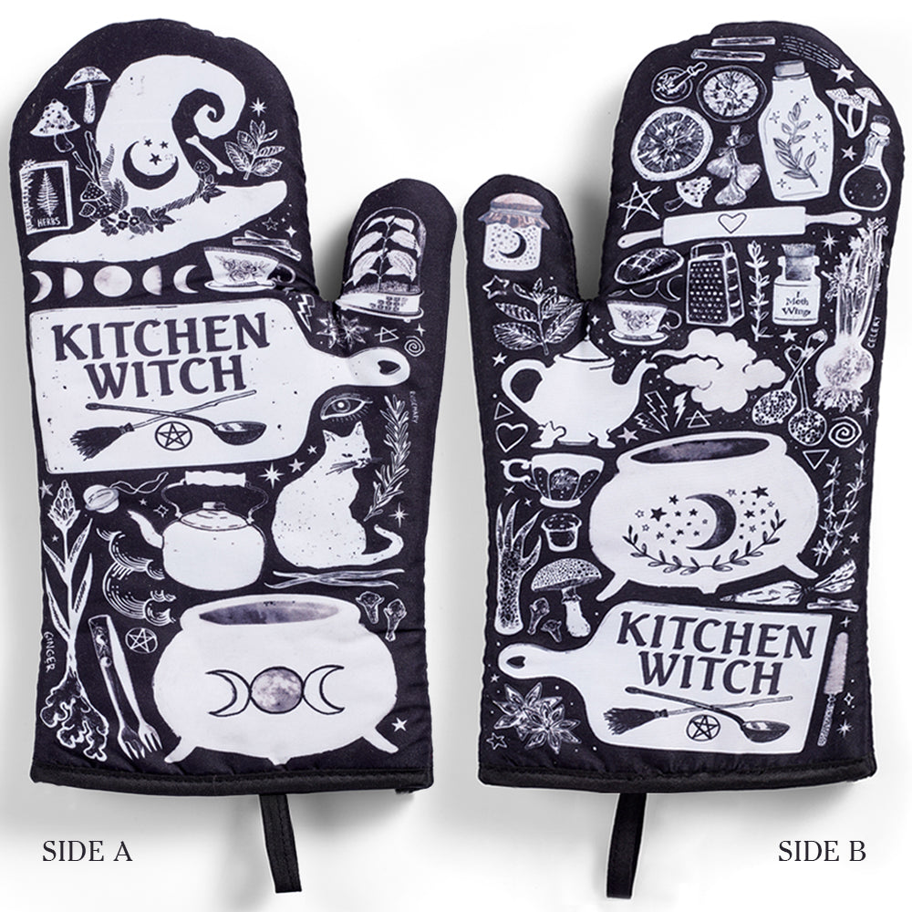 Pair of purple, black, and white kitchen witch oven mitts with herb motifs from Spirit Nest Kitchen Witch Oven Mitt Set.