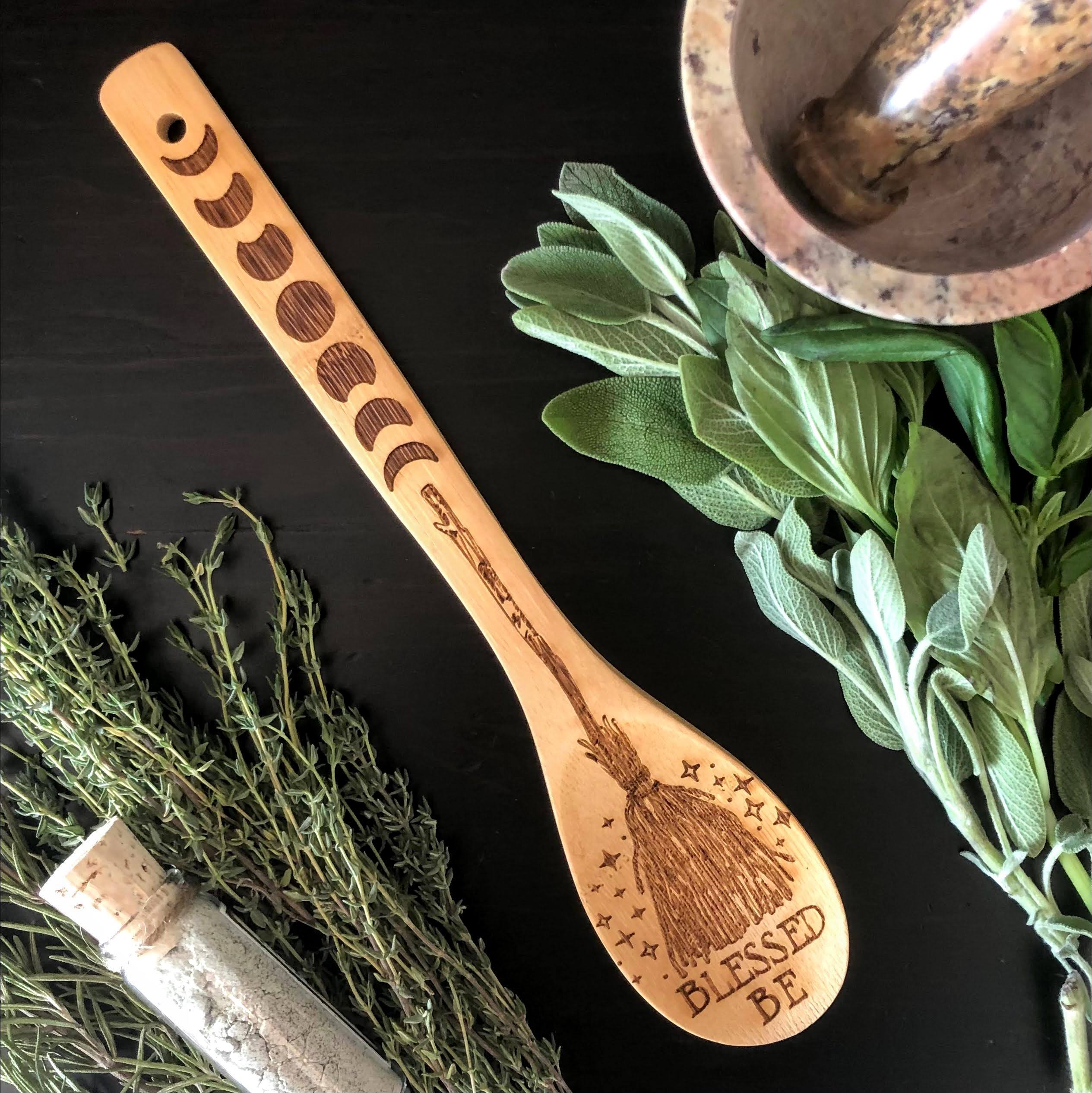 Set of three witchy bamboo wooden spoons for kitchen use, crafted by Spirit Nest with a mystical, handcrafted design.