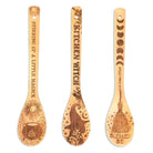 Set of three witchy bamboo wooden spoons for kitchen use by Spirit Nest, featuring mystical engraved designs.