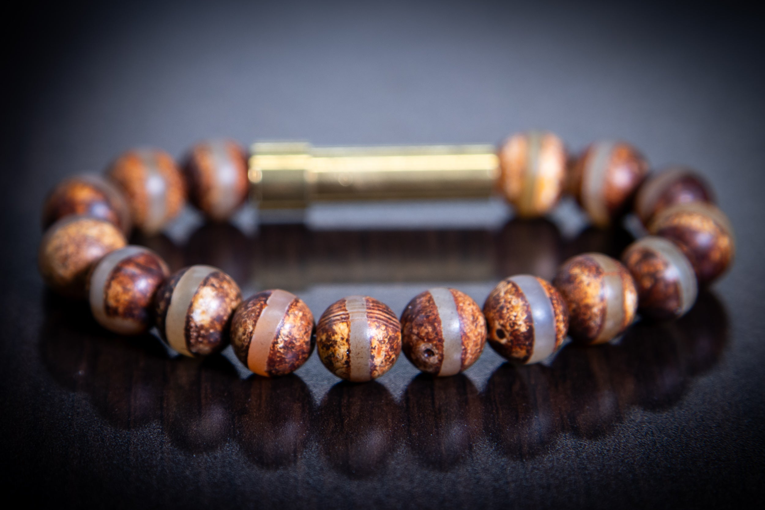 Silver Tibetan Agate Bead Cremation Jewelry Bracelet by Spirit Pieces, designed for hair, fur, or ash with clear stripe detailing.