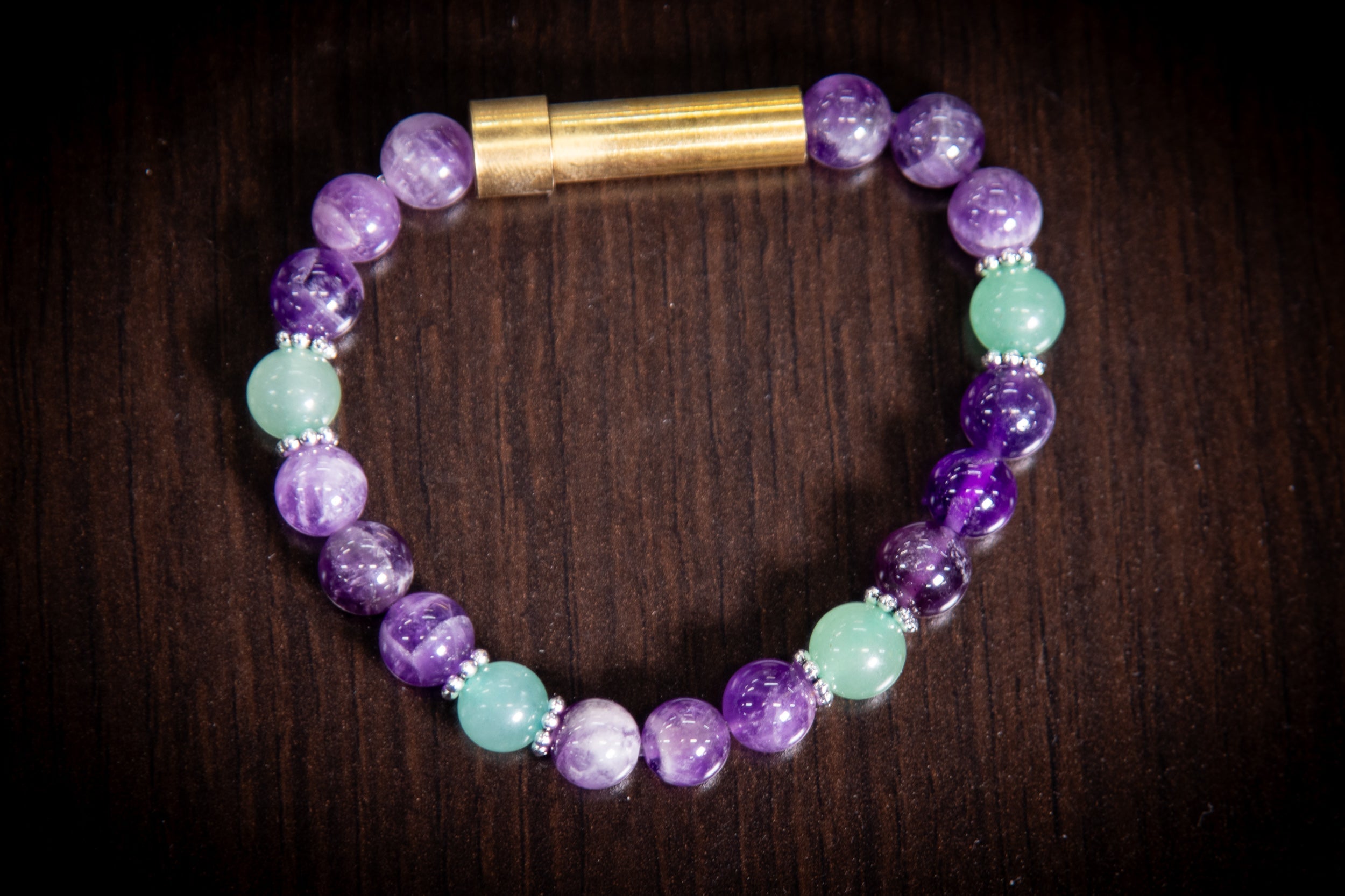 Silver cremation jewelry bracelet with amethyst and aventurine beads, designed for hair, fur, or ashes, by Spirit Pieces.