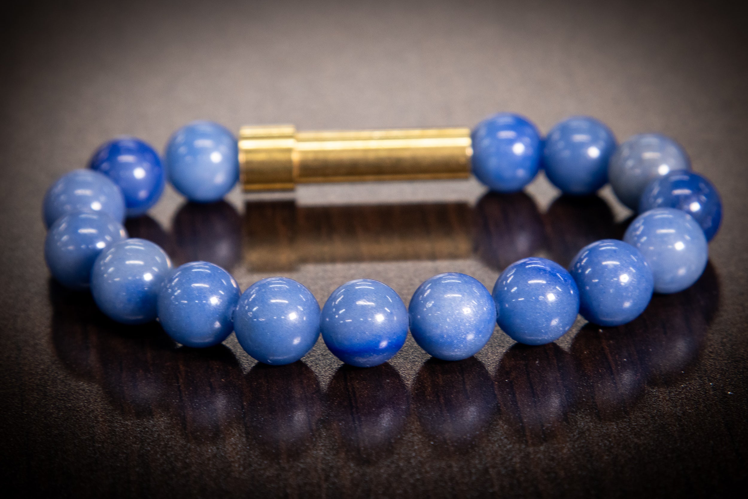 Silver cremation jewelry bracelet with blue apatite beads, designed for hair, fur, or ash keepsakes by Spirit Pieces.