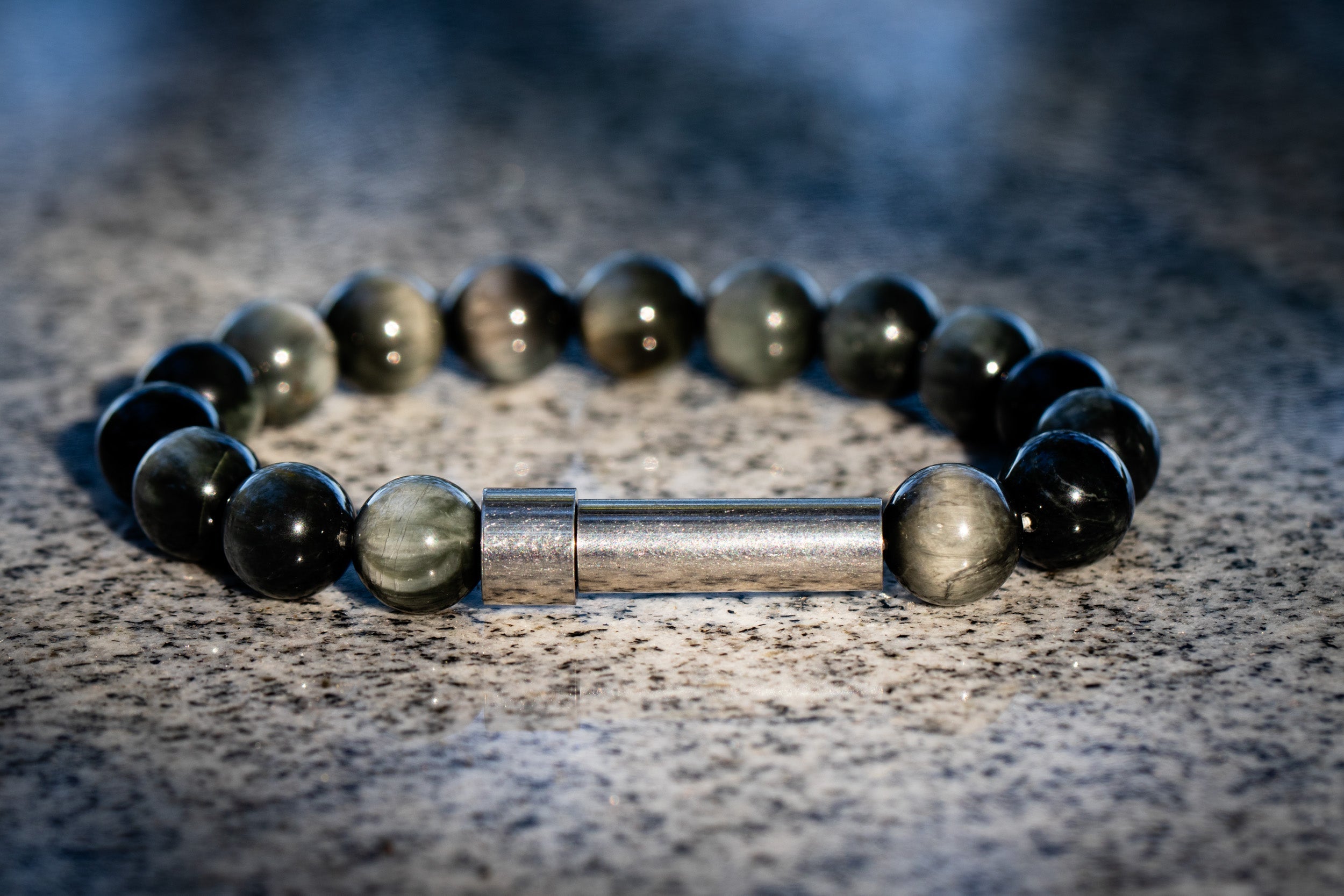 Silver Eagle Eye Cremation Bracelet by Spirit Pieces, designed for hair, fur, or ashes, featuring a detailed eagle eye charm.