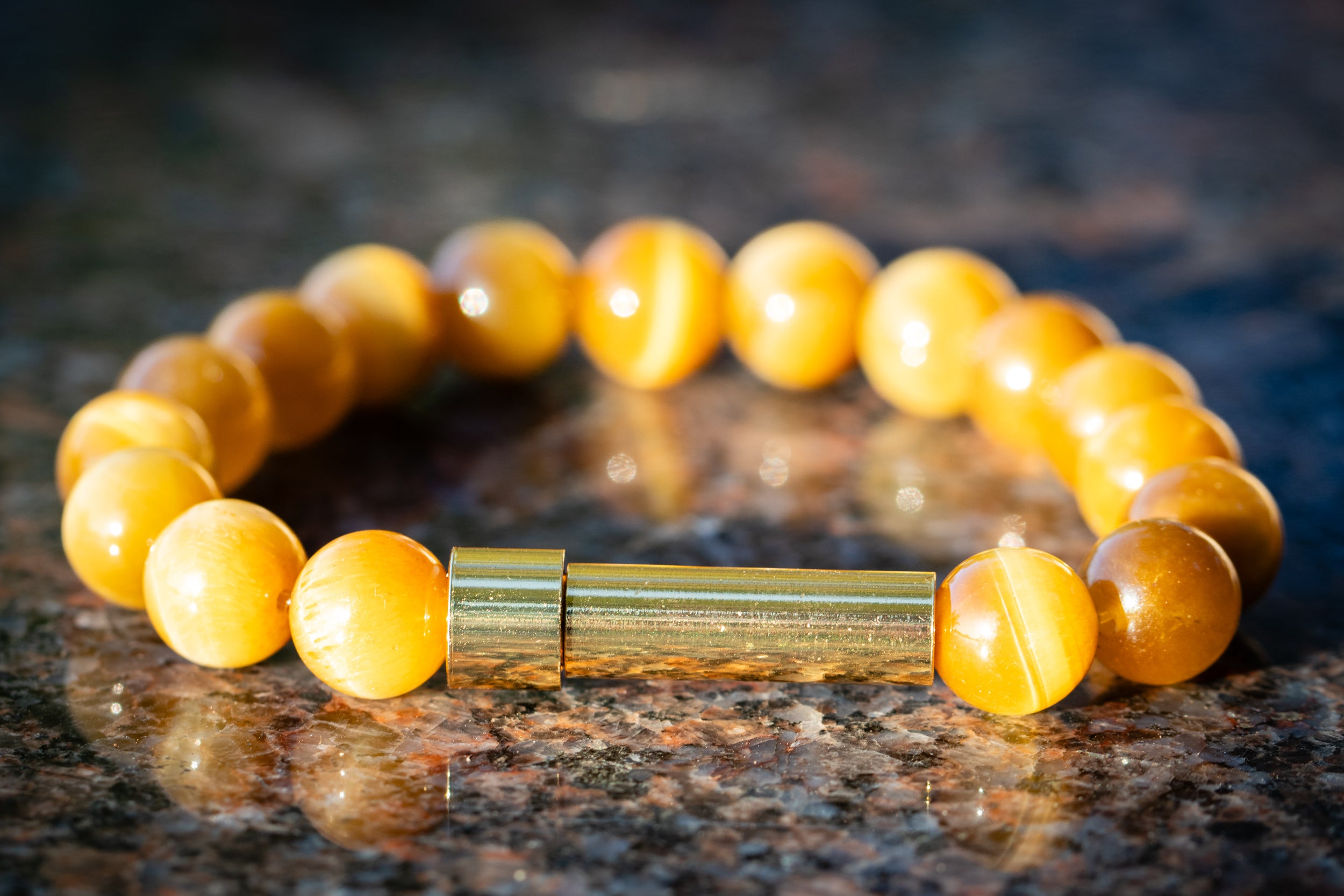 Silver Honey Tiger Eye cremation bracelet by Spirit Pieces, designed to hold hair, fur, or ashes in a delicate jewelry piece.