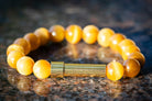 Silver Honey Tiger Eye cremation bracelet by Spirit Pieces, designed to hold hair, fur, or ashes in a delicate jewelry piece.