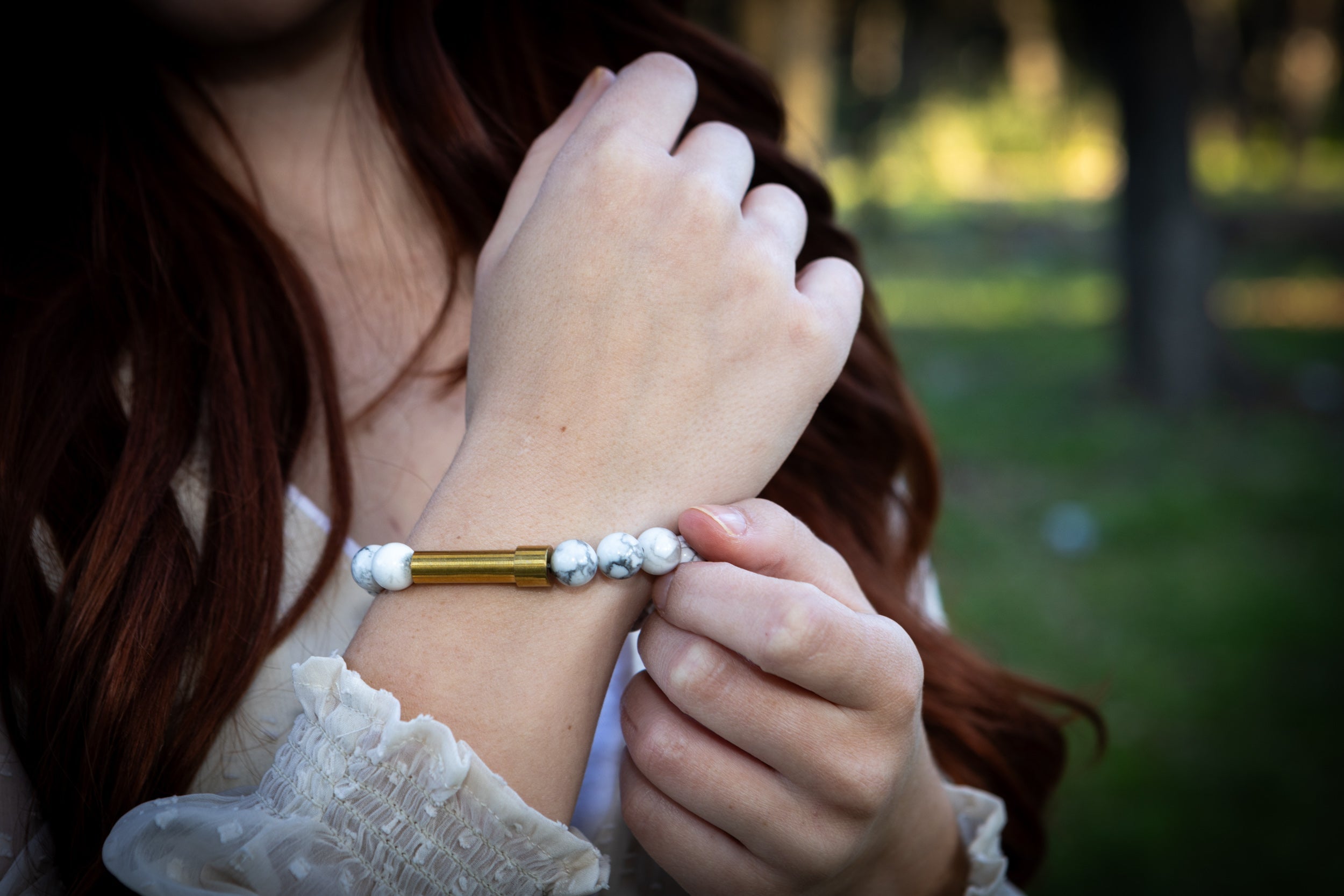 Silver Howlite healing bracelet by Spirit Pieces, designed for hair, fur, or ash cremation jewelry, featuring polished stones.