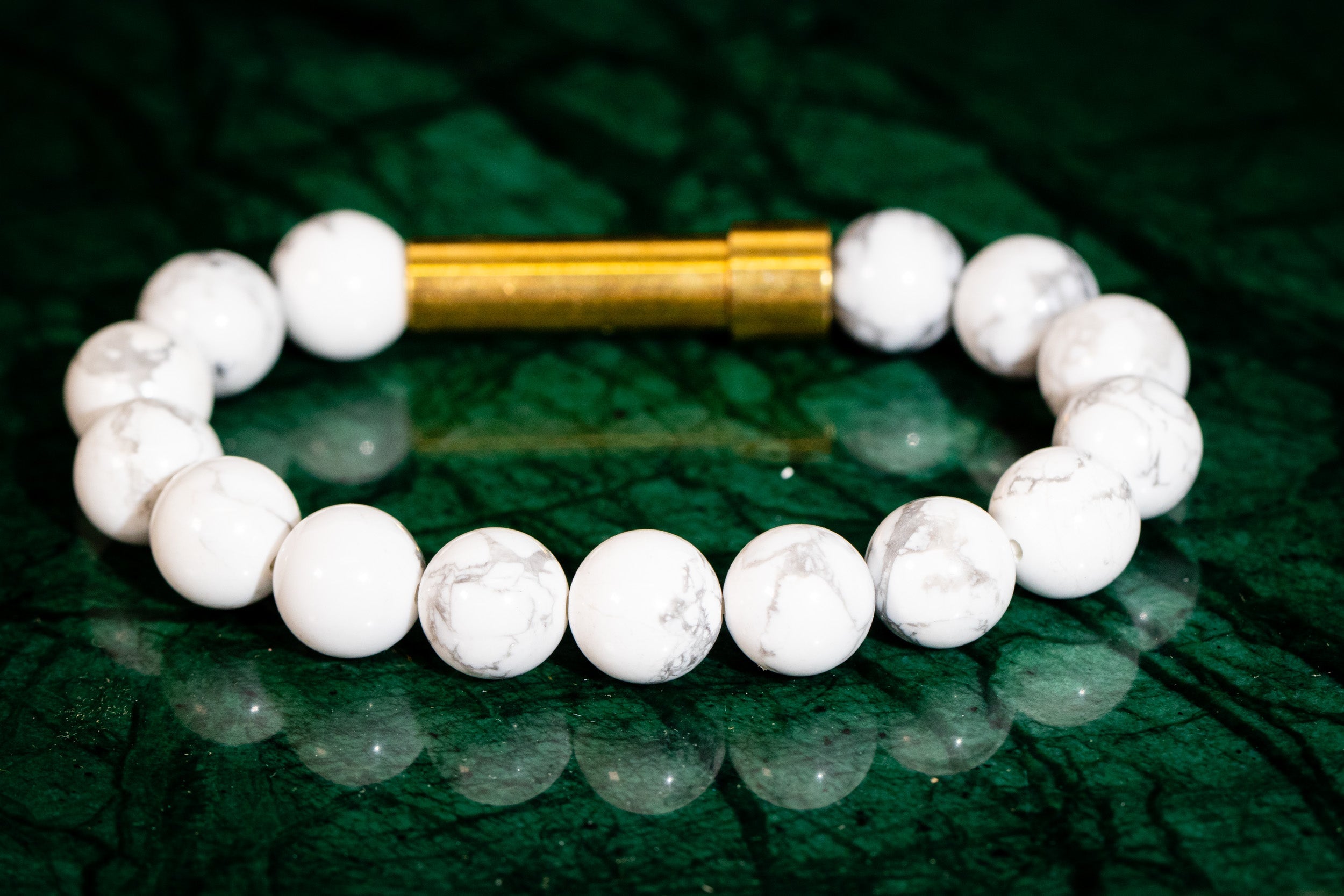 Silver Howlite healing bracelet by Spirit Pieces, cremation jewelry for hair, fur, or ashes, featuring small polished beads.