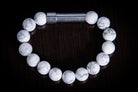 Silver Howlite healing bracelet by Spirit Pieces, cremation jewelry for hair, fur, or ash, featuring polished stone beads.