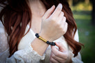 Silver cremation jewelry bracelet with black lava stones, designed for fur or ashes, by Spirit Pieces.