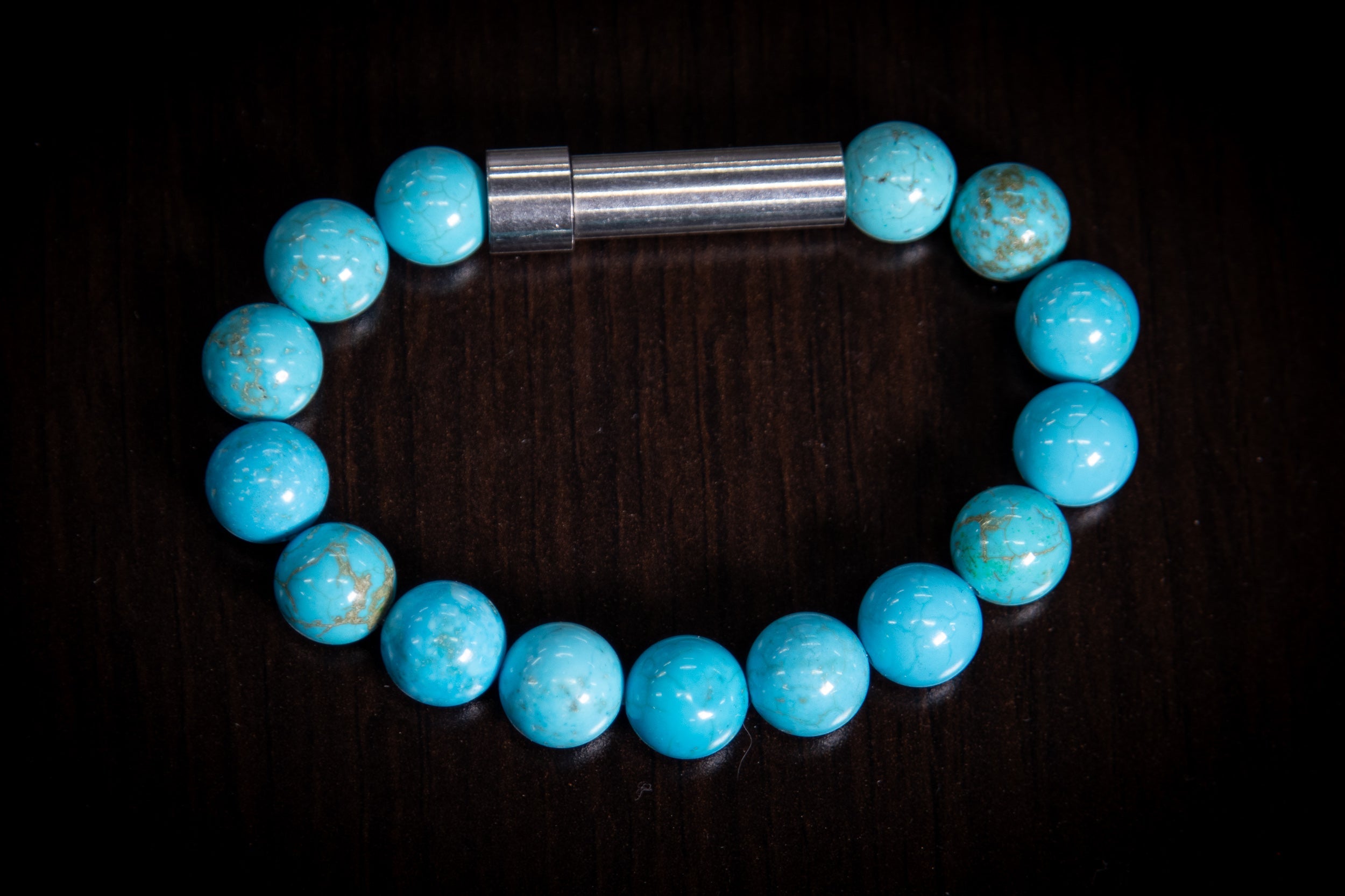 Silver Magnesite healing bracelet by Spirit Pieces, cremation jewelry for hair, fur, or ashes, featuring polished beads.