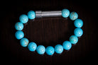 Silver Magnesite healing bracelet by Spirit Pieces, cremation jewelry for hair, fur, or ashes, featuring polished beads.