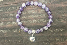 Silver Dogtooth Amethyst Urn Bracelet by Spirit Pieces, cremation jewelry bracelet with purple gemstone and delicate design.
