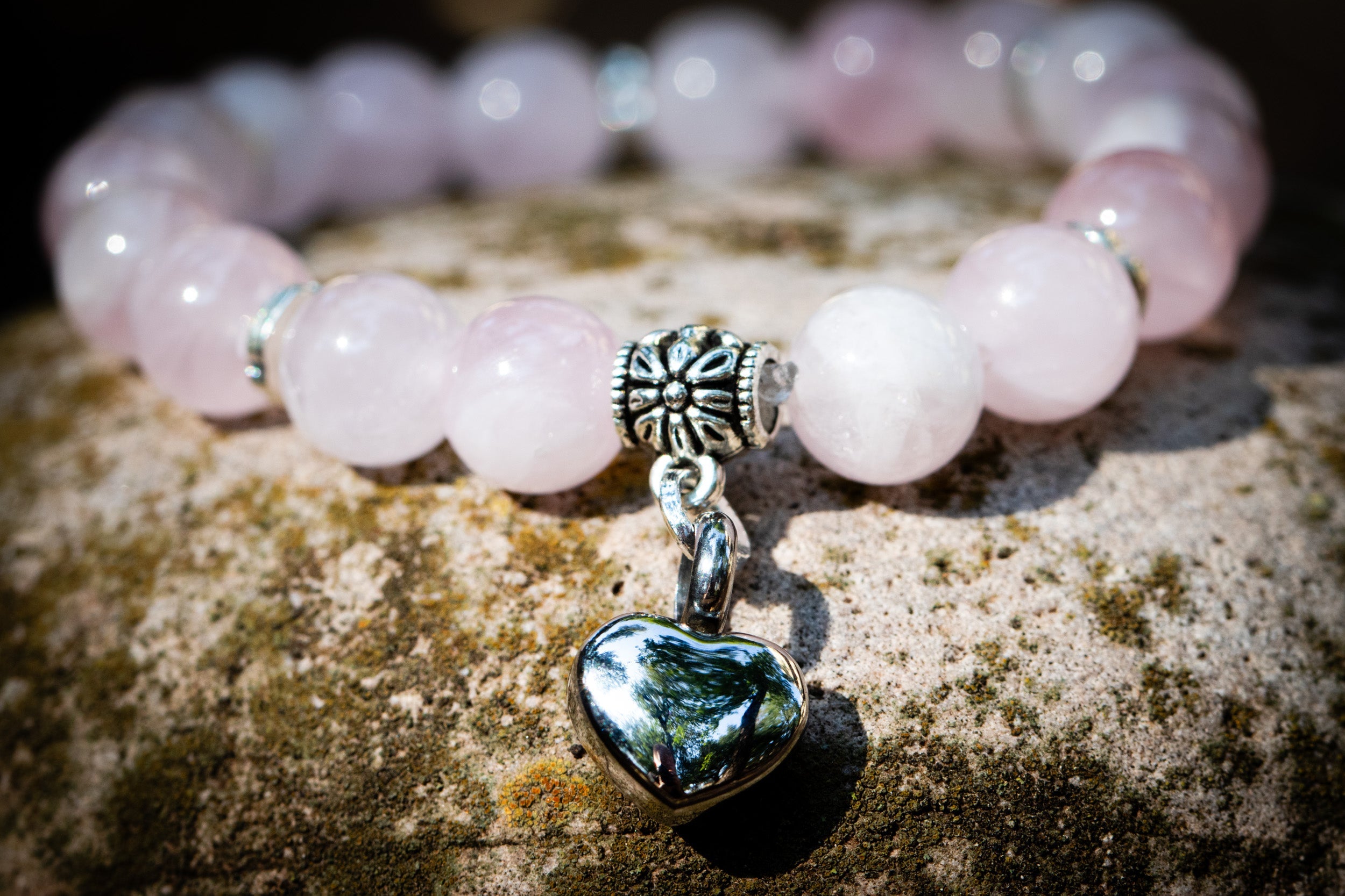 Silver Rose Quartz Keepsake Heart Bracelet by Spirit Pieces, cremation jewelry bracelet with a delicate heart design.