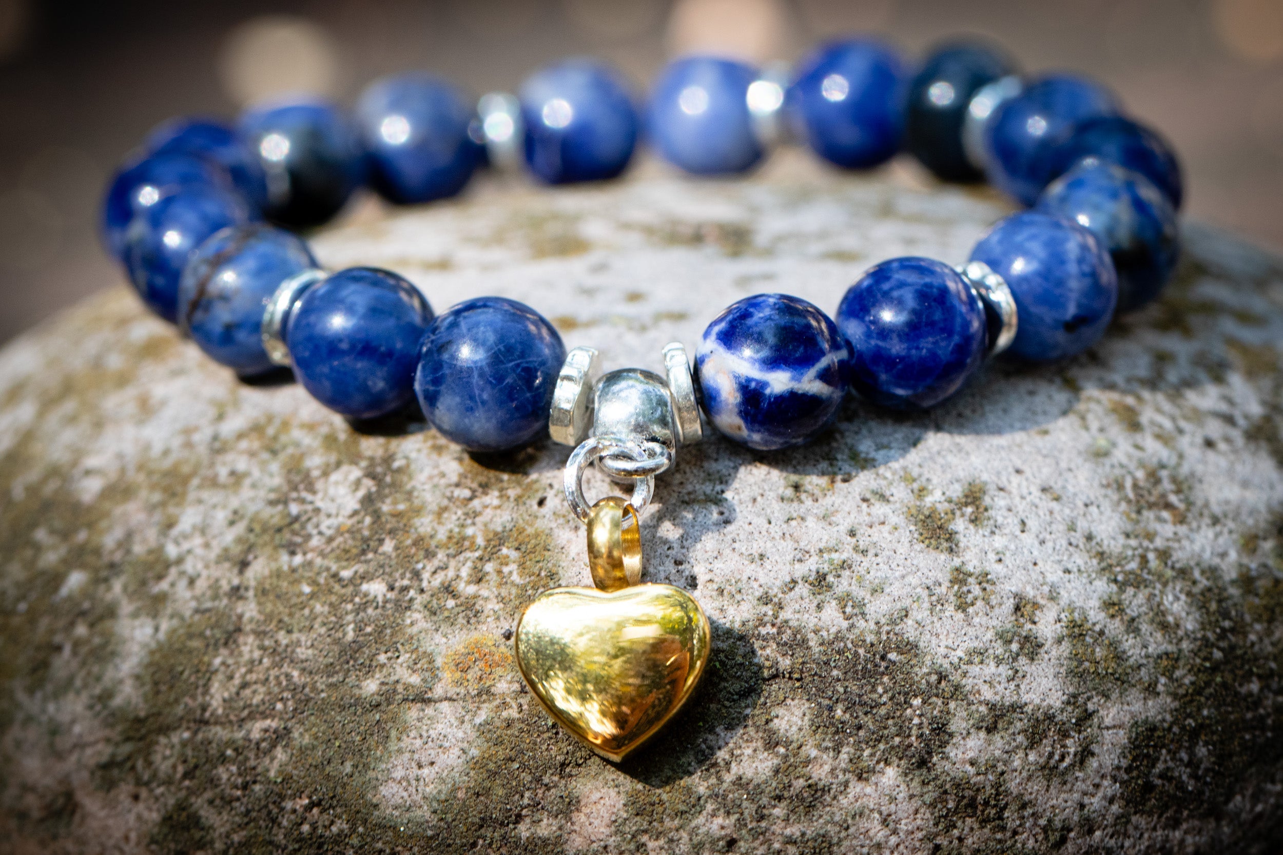 Silver Sodalite keepsake urn heart bracelet by Spirit Pieces, featuring a pendant with a cremation jewelry design and delicate chain.
