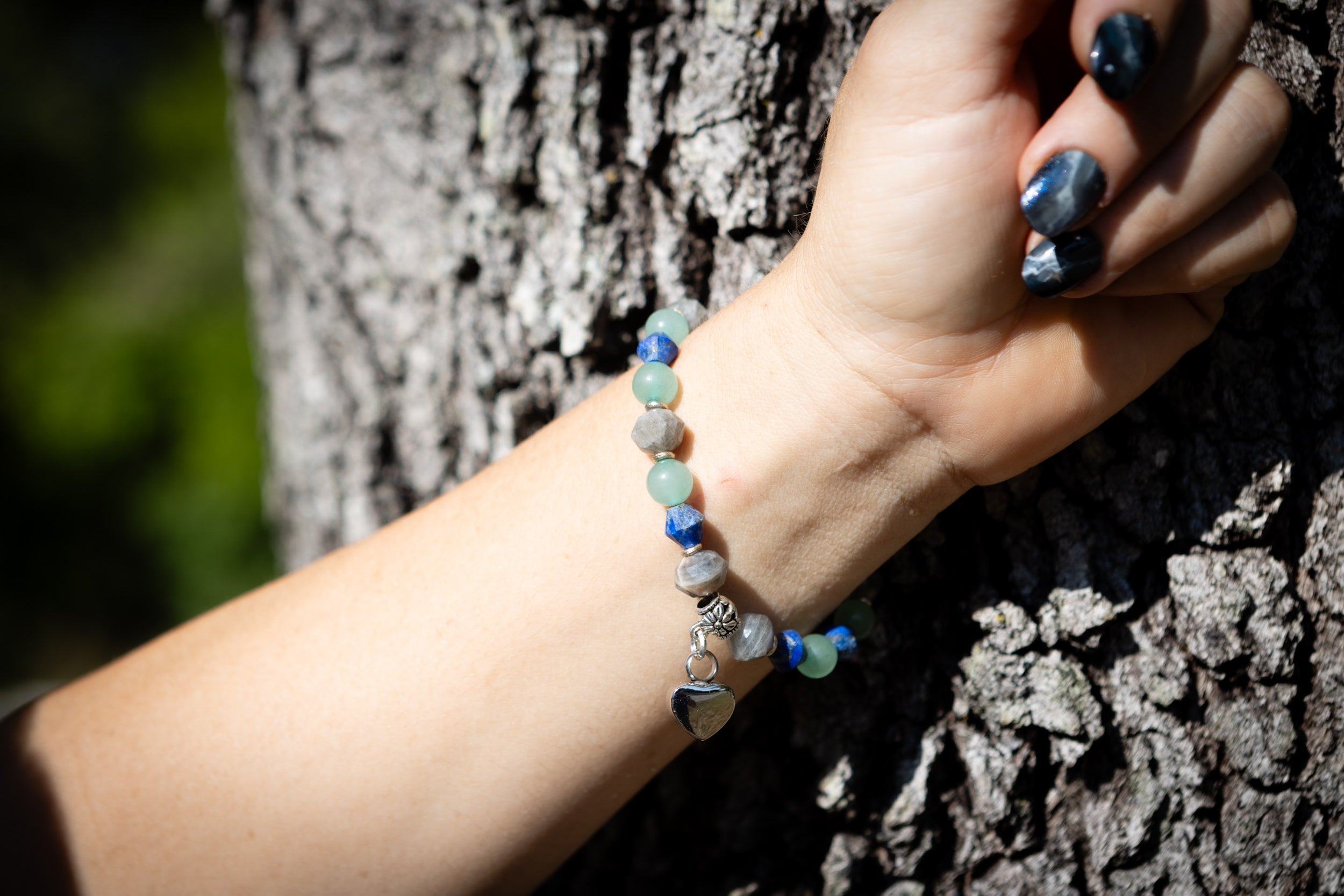 Silver cremation jewelry bracelet with sodalite, labradorite, and aventurine keepsake stones from Spirit Pieces.