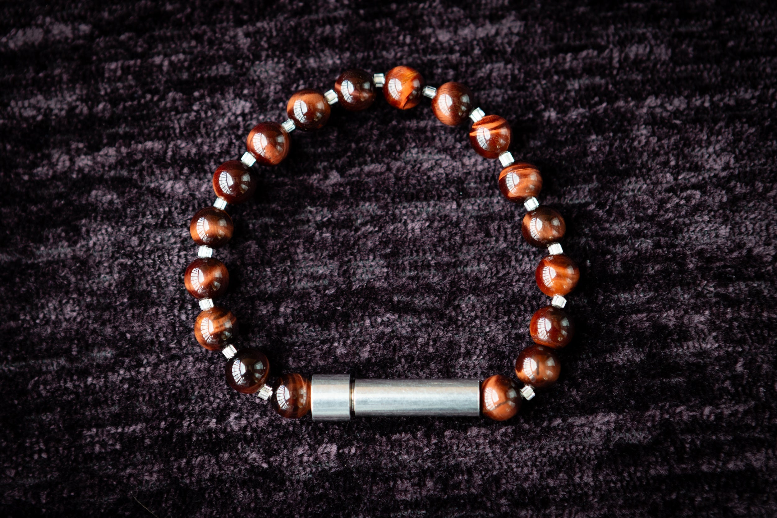 Red Tiger Eye bracelet by Spirit Pieces, cremation jewelry bracelet for hair, fur, or ashes with silver accents.