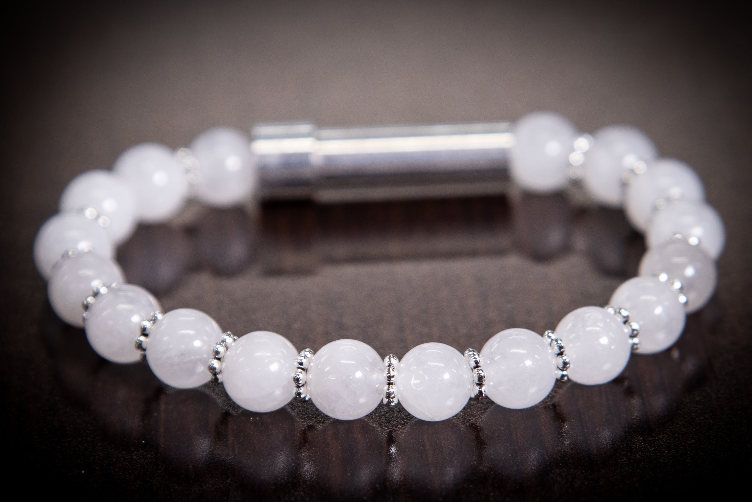 Silver Snow Quartz cremation jewelry bracelet by Spirit Pieces, designed for holding hair, fur, or ashes in a delicate bracelet setting.