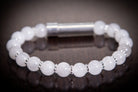 Silver Snow Quartz cremation jewelry bracelet by Spirit Pieces, designed for holding hair, fur, or ashes in a delicate bracelet setting.