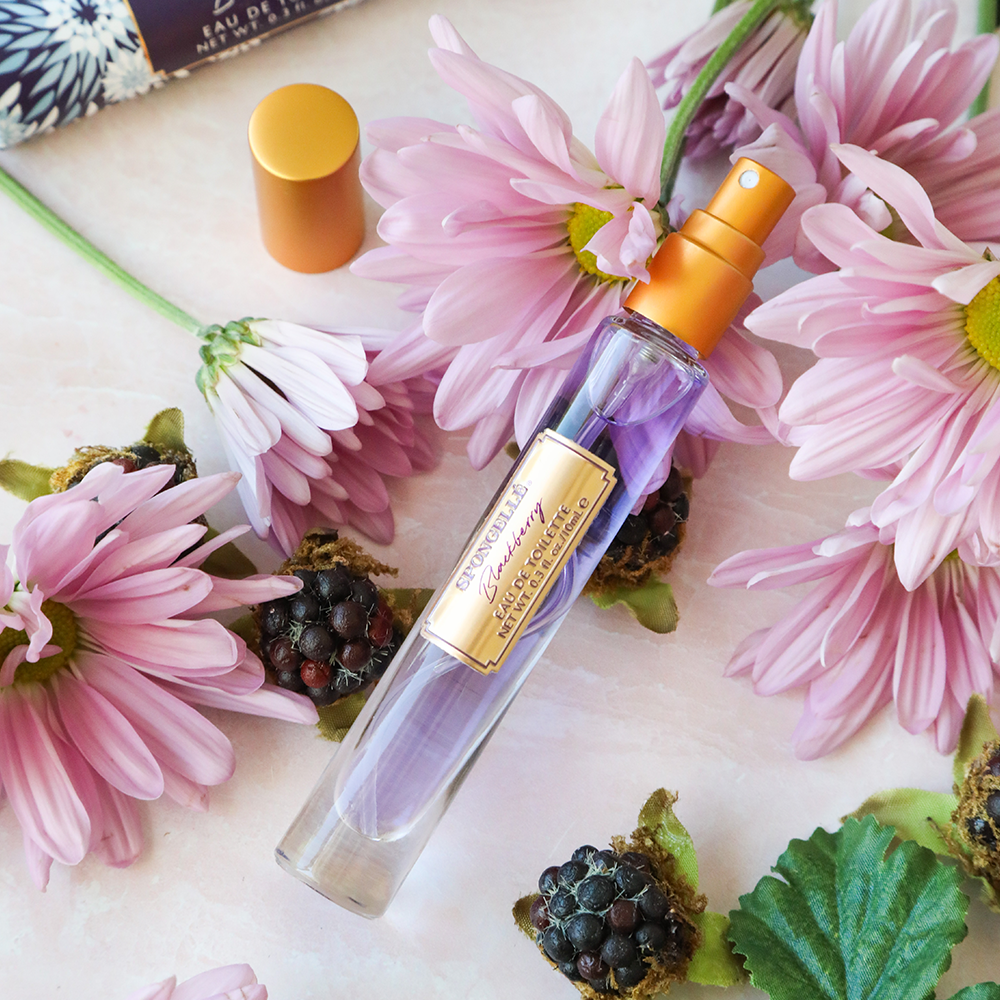 Spongellé Blackberry Private Reserve Eau de Toilette body fragrance bottle with a sleek design and dark purple accents.