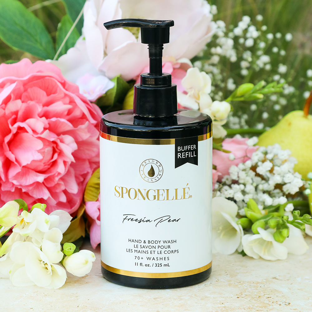 Spongellé Freesia Pear Hand & Body Wash Refill bottle with floral design and label, showcasing the body wash product.