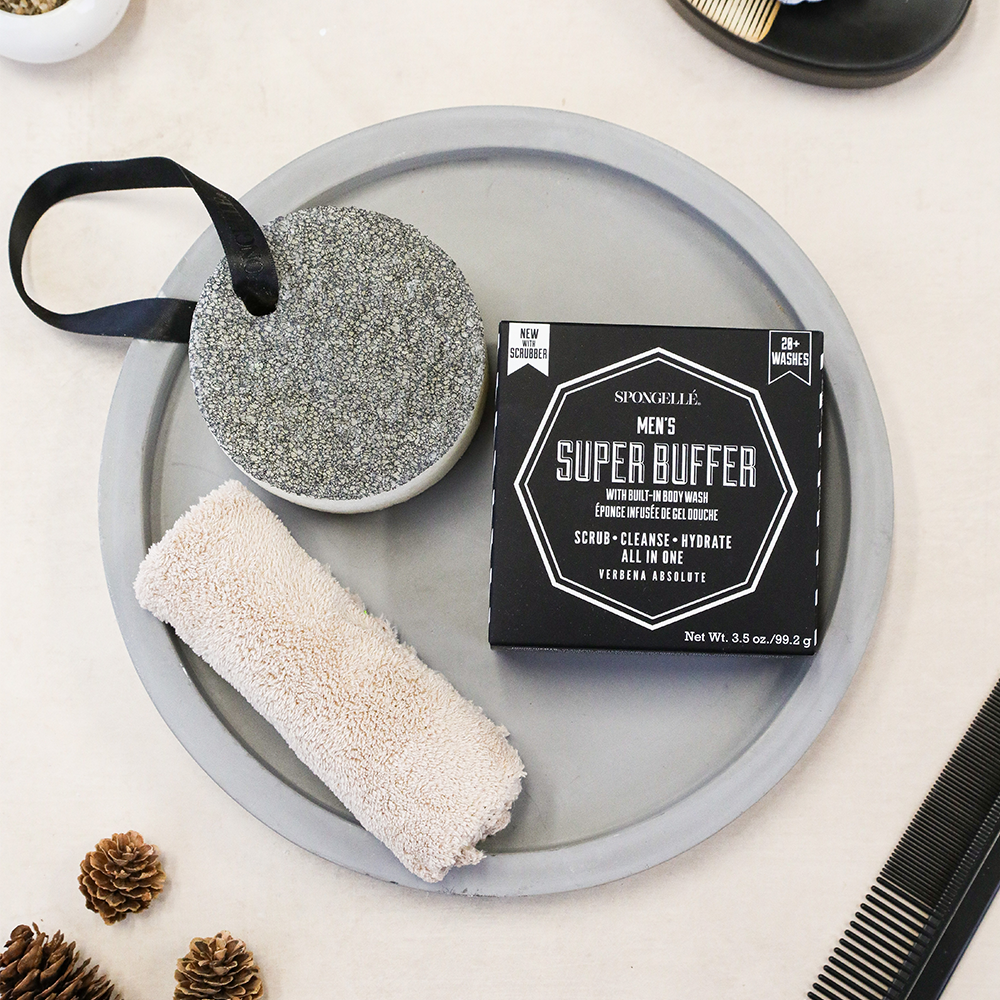 Men's Super Buffer by Spongellé, black body wash infused scrubber for exfoliating and cleansing skin.