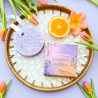 Spongellé Acoustic Harmony Love & Notes Body Buffer, a body wash-infused buffer with a floral design and soft texture.