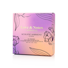 Spongellé Acoustic Harmony Love & Notes Body Buffer, a fragrant body wash-infused exfoliating buffer with floral design.