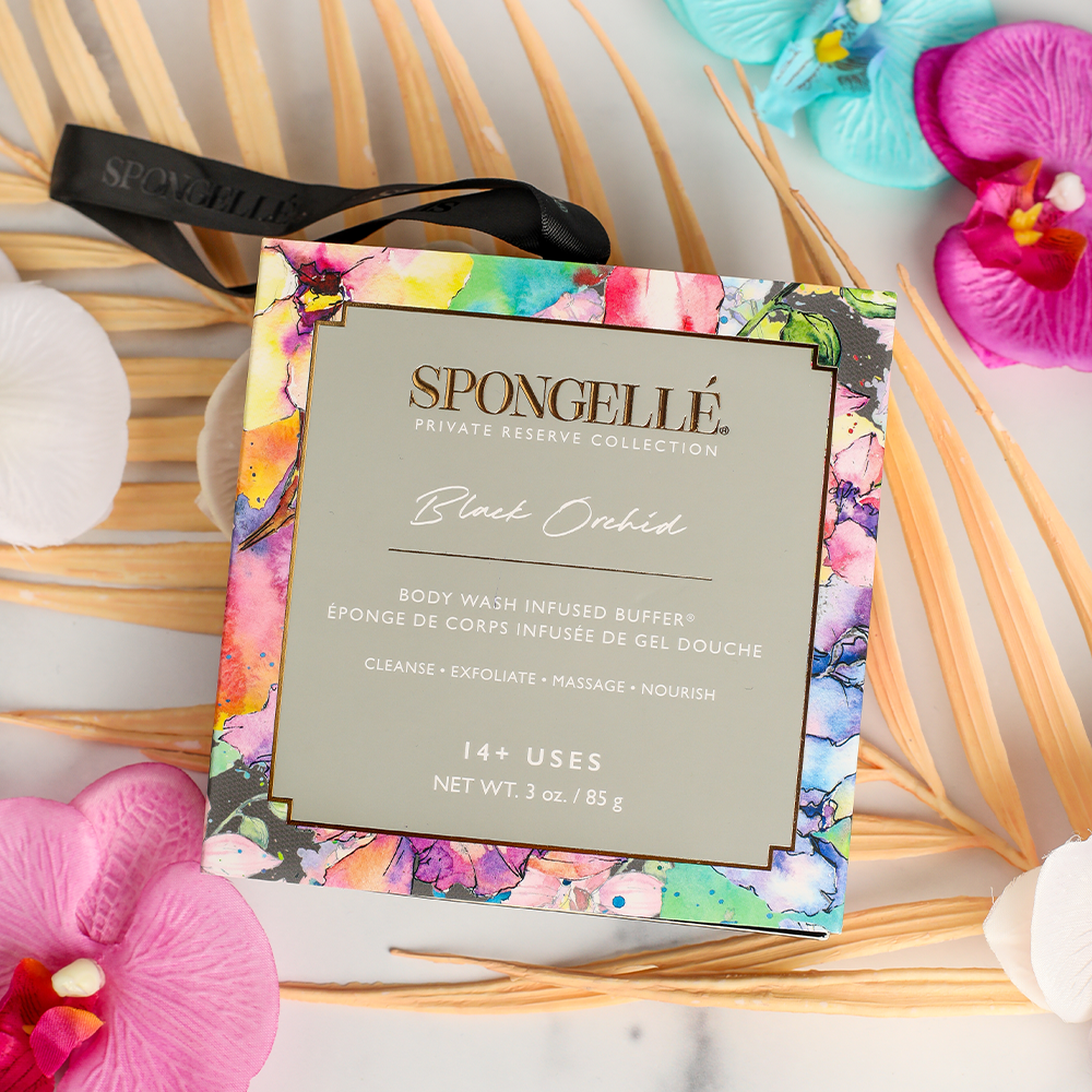 Spongellé Black Orchid Body Wash Infused Buffer with boxed flower design for luxurious skin cleansing and exfoliation.