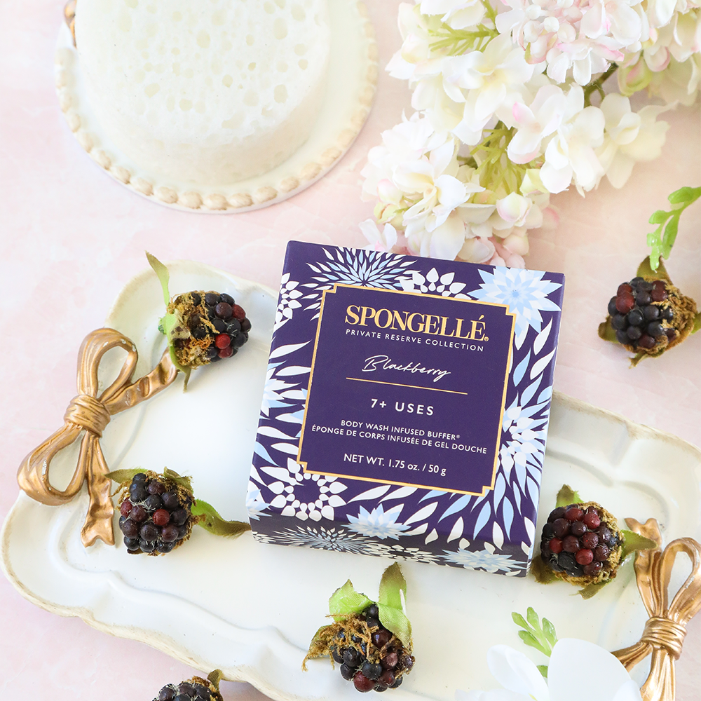 Blackberry Spongette body wash infused buffer by Spongellé showing a textured sponge with blackberry scent and vibrant purple color.