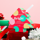 Spongellé Bright Juniper Holiday Tree body wash-infused buffer with festive juniper scent and holiday-themed design.