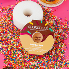 Spongellé Cocoa Bon Body Wash Infused Buffer with rich cocoa scent and soft exfoliating texture for luxurious skincare.