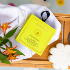 Spongellé Coconut Verbena Body Wash Infused Buffer in boxed flower packaging, soft sponge with floral design and coconut-verbena scent.