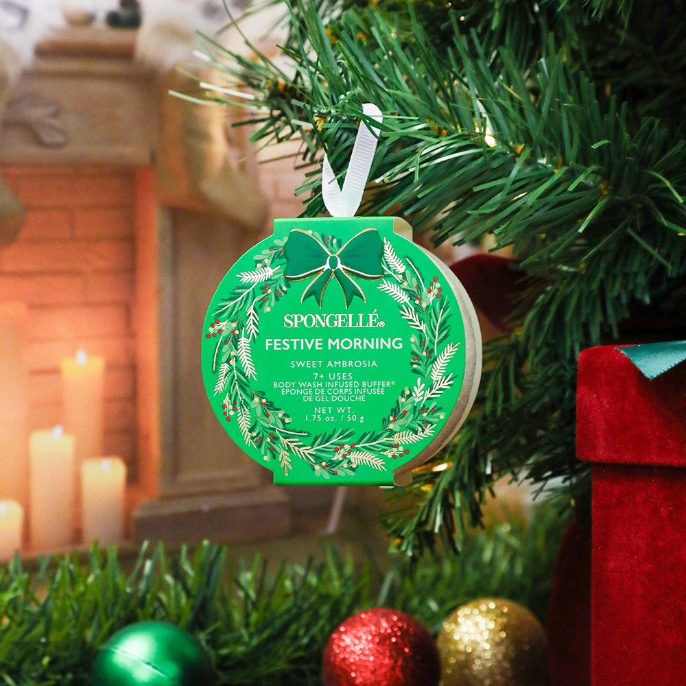 Spongellé Festive Morning Sweet Ambrosia holiday wreath body wash infused buffer with festive holiday design.