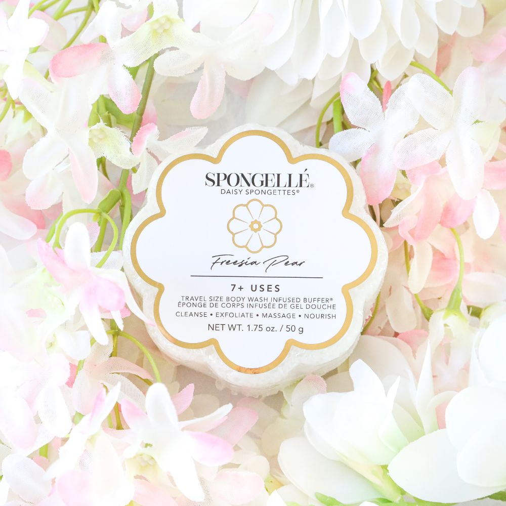 Freesia Pear Daisy Spongette body wash infused buffer by Spongellé, soft sponge with floral scent for gentle cleansing.