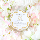 Freesia Pear Daisy Spongette body wash infused buffer by Spongellé, soft sponge with floral scent for gentle cleansing.