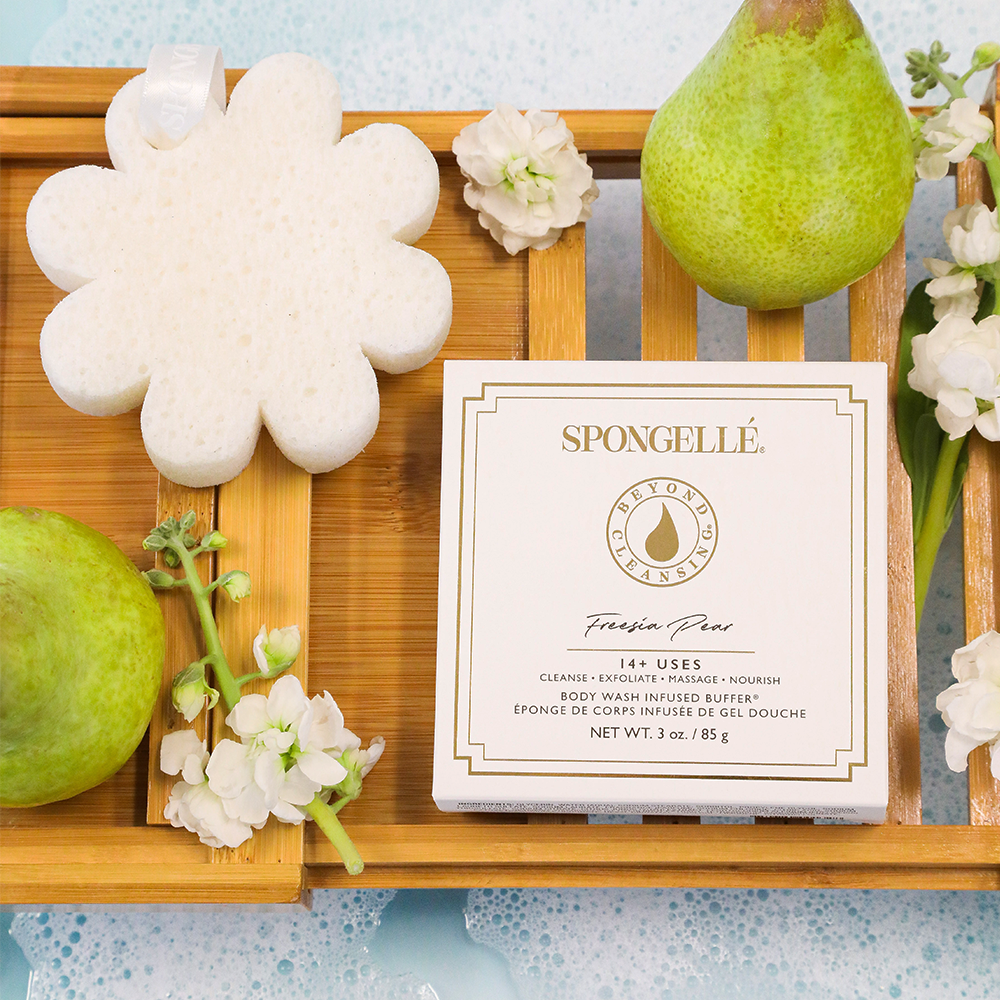 Spongellé Freesia Pear vegan-friendly body wash infused buffer with floral design in a boxed packaging.