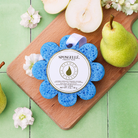 Spongellé Freesia Pear Wild Flower bath sponge, a body wash infused buffer with floral scent and textured surface for cleansing.