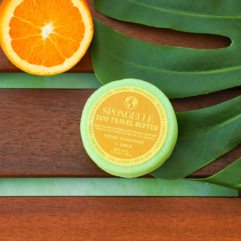Spongellé Fresh Tangerine Eco Travel Body Wash Infused Buffer showing textured sponge with fresh tangerine scent and compact design.