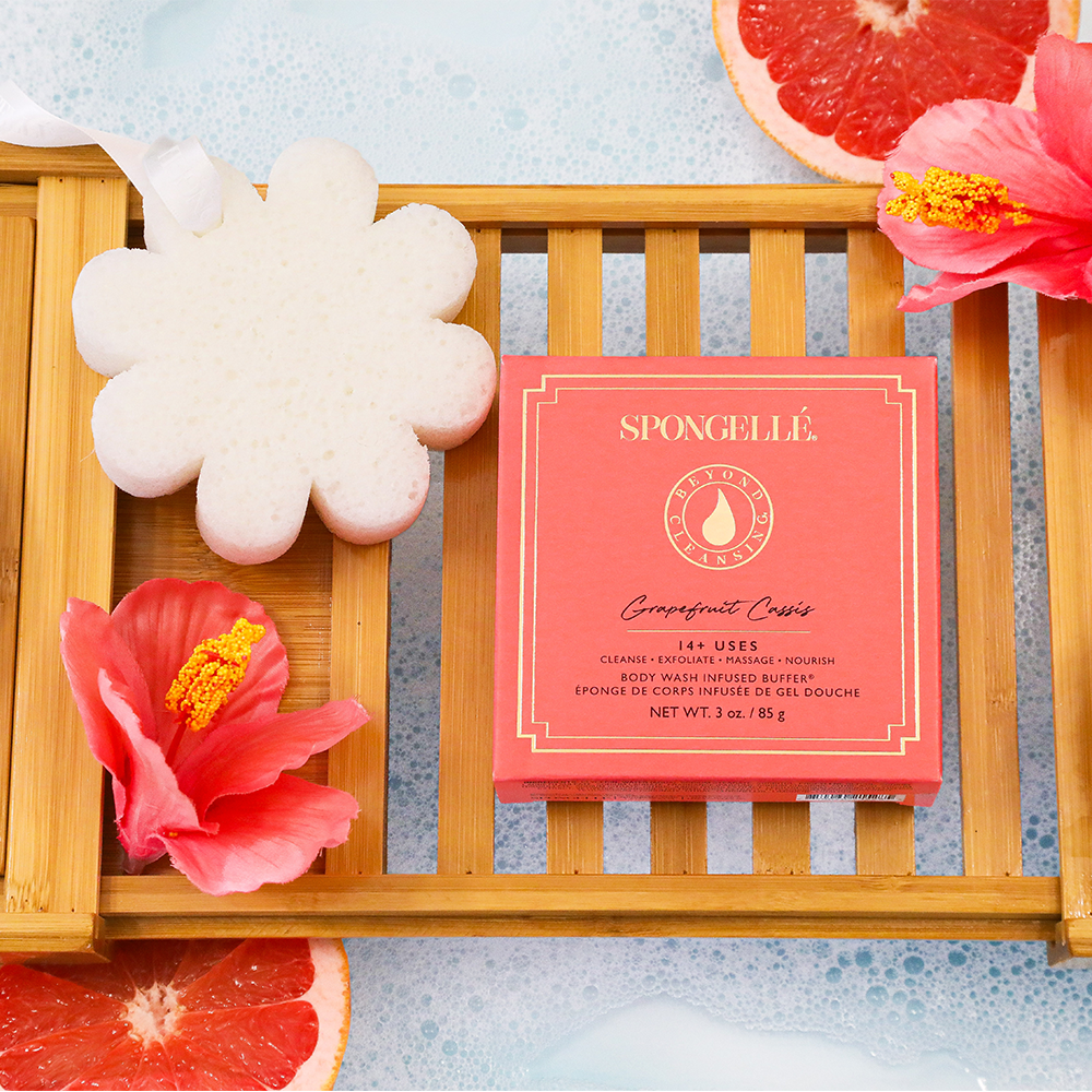 Spongellé Grapefruit Cassis Body Wash Infused Buffer in a boxed floral design, showing the textured body wash sponge.