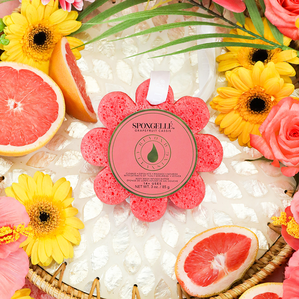 Spongellé Grapefruit Cassis Wild Flower Body Wash Infused Buffer with vibrant floral and citrus design, textured for skincare.