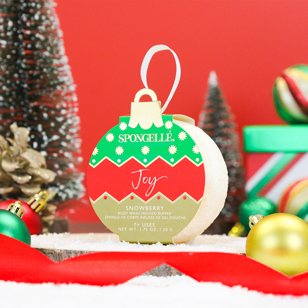 Spongellé Joy Snowberry holiday ornament body wash infused buffer with festive design and floral scent.