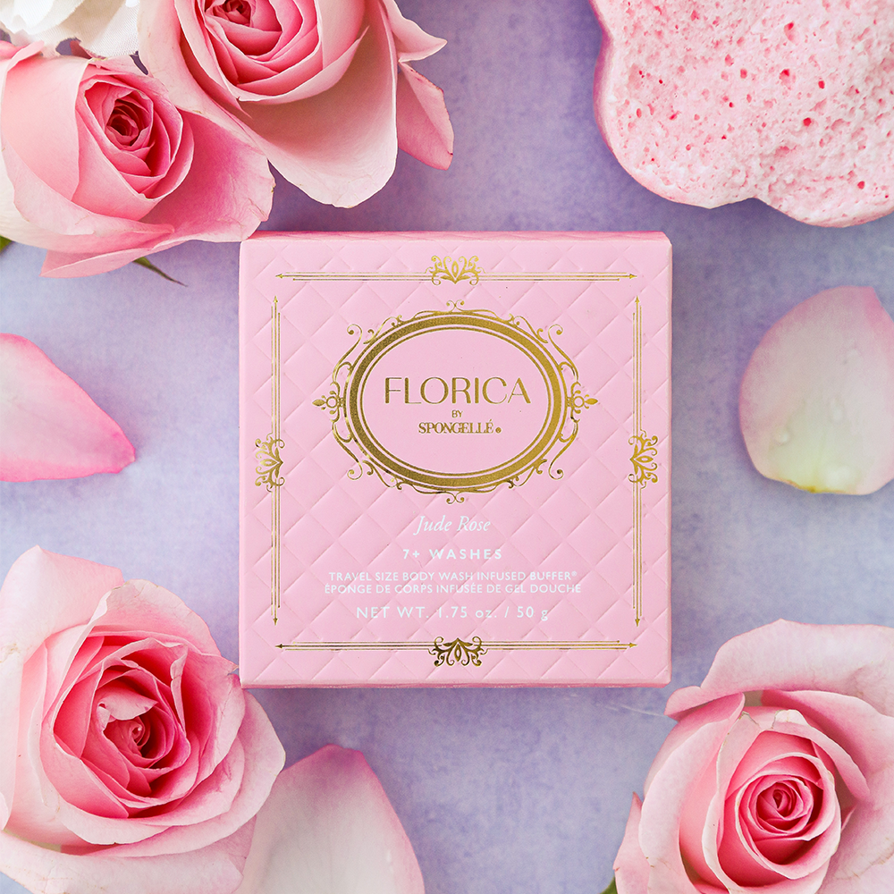 Spongellé Jude Rose Spongette body wash infused buffer with floral pink accents and soft textured surface for gentle cleansing.
