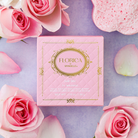 Spongellé Jude Rose Spongette body wash infused buffer with floral pink accents and soft textured surface for gentle cleansing.